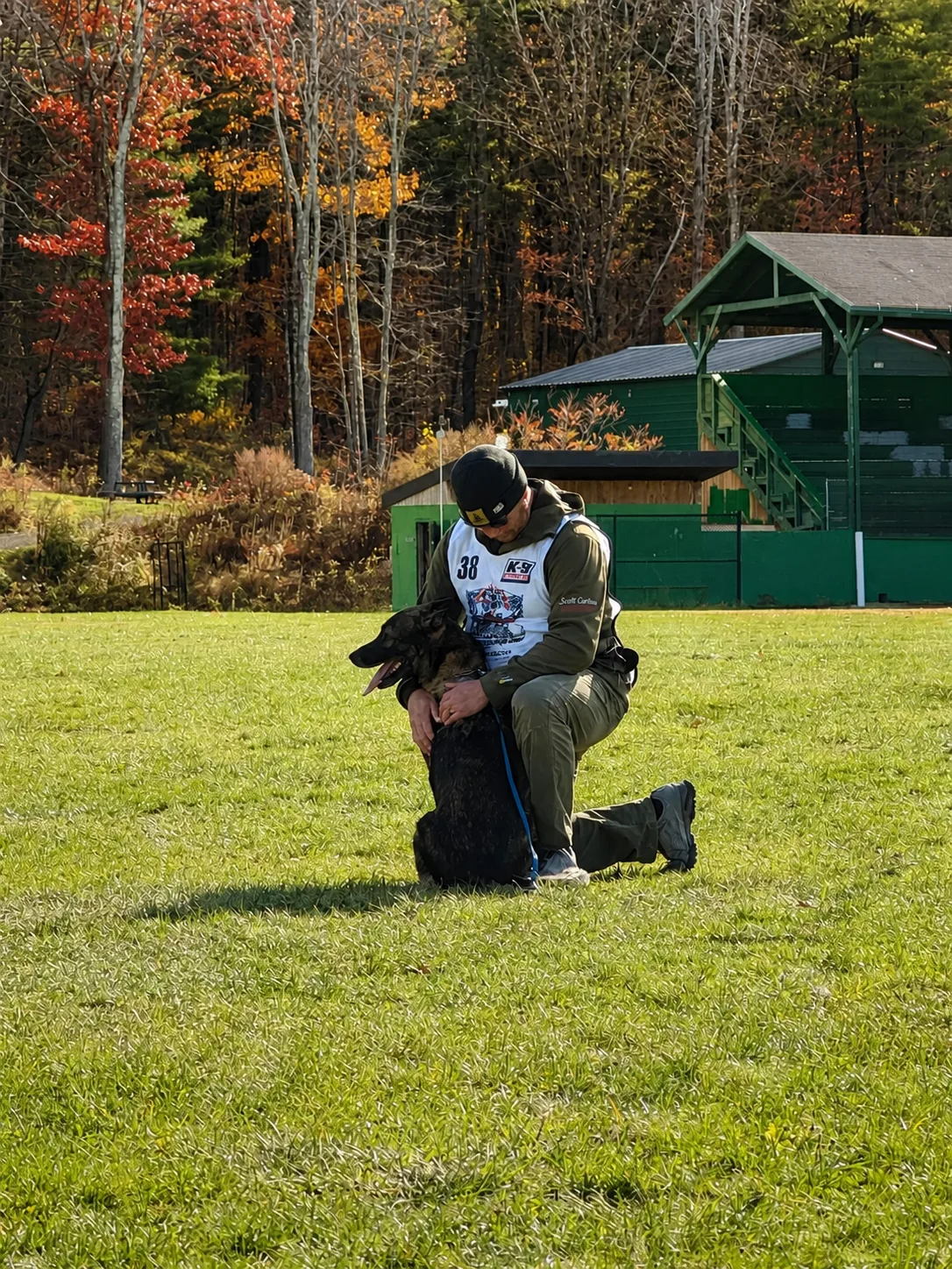 Scott Carlson with his dog on a competition field